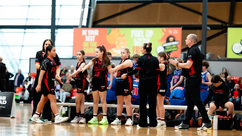 Basketball community gathering at local courts