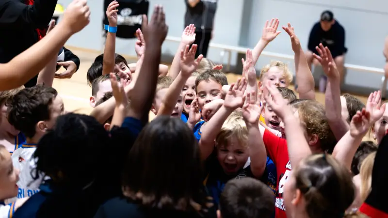 Basketball community gathering at local courts
