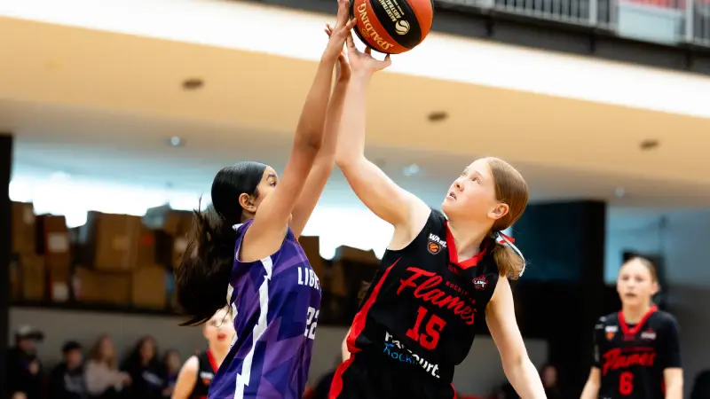 Basketball community gathering at local courts