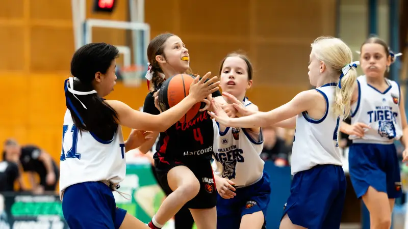 Basketball community gathering at local courts