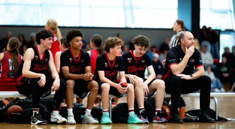 Basketball community gathering at local courts