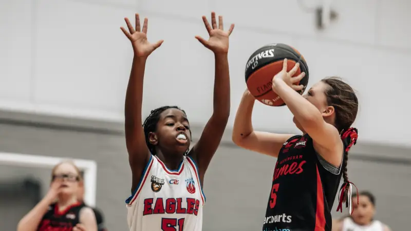 Basketball community gathering at local courts